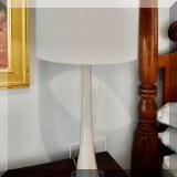 D09. One of a pair of glass lamps. 31”h 